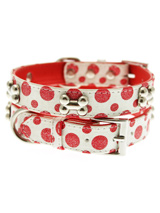 Red / White Polka Dot Glitter Silver Bone Collar - This striking red and white leather collar with stitched edging has a hint of glitter, finished with three chrome bones and will look great for walkies. A very smart addition to the wardrobe of any trendy pooch.S Width: 14mmM Width: 19mmL Width: 25mm