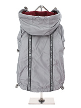 Silver Grey Rainstorm Rain Coat - Our new Grey Rainstorm Rain coat will protect your dog from the rain and with it's hi-visibility stripe will help them be seen. The adjustable draw string hood will keep the raincoat snug to your dogs face and a drawstring on the hem will allow you to get a nice tight fit to keep the body warm and d...